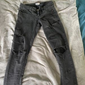 Garage black stretch distressed ripped jeans